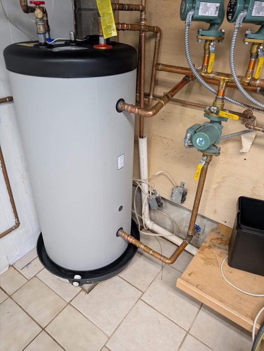 Indirect water heater with copper supply and return, zone valves, and circulators